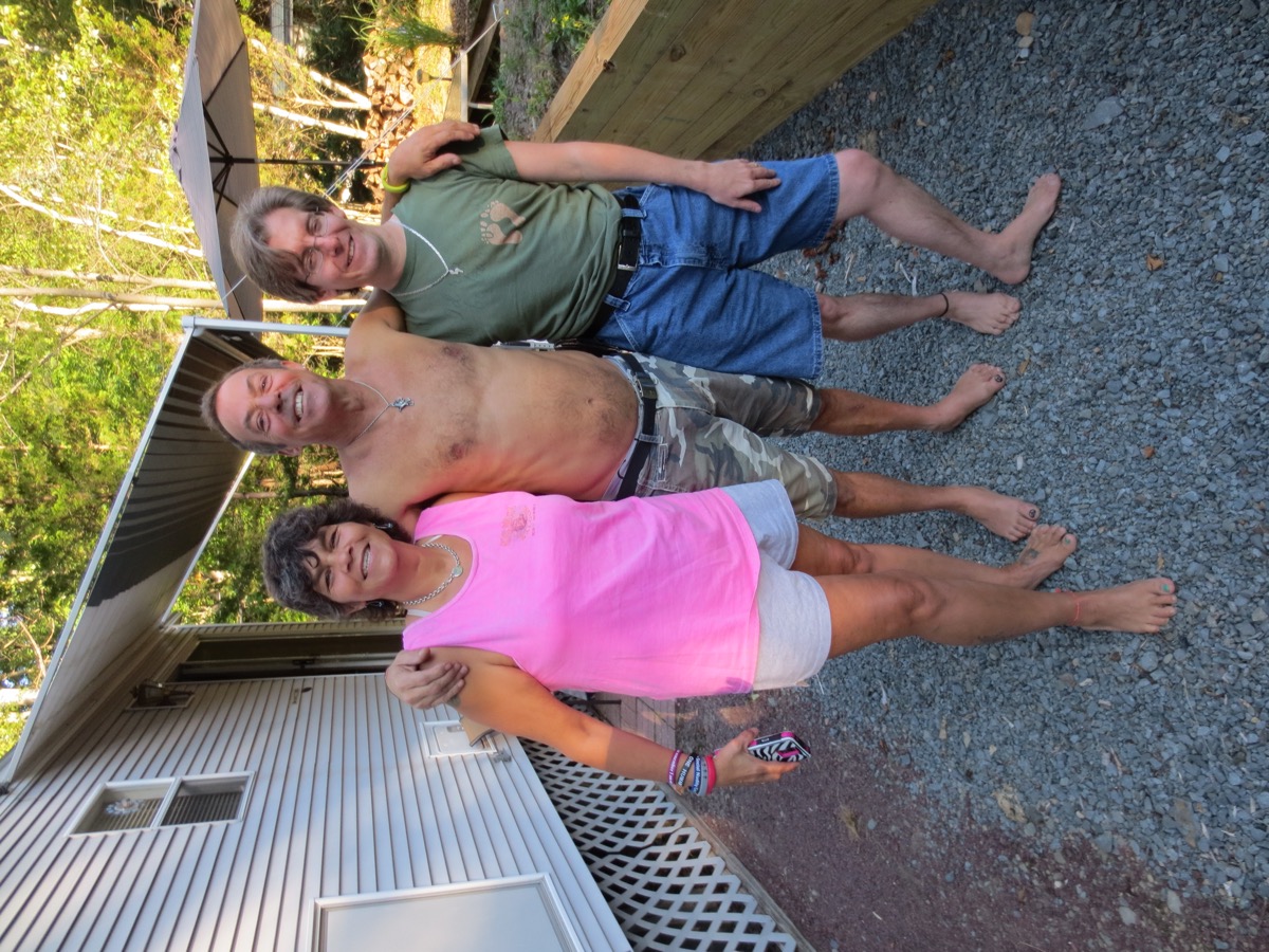 Barefoot hikers all smiles after a hike